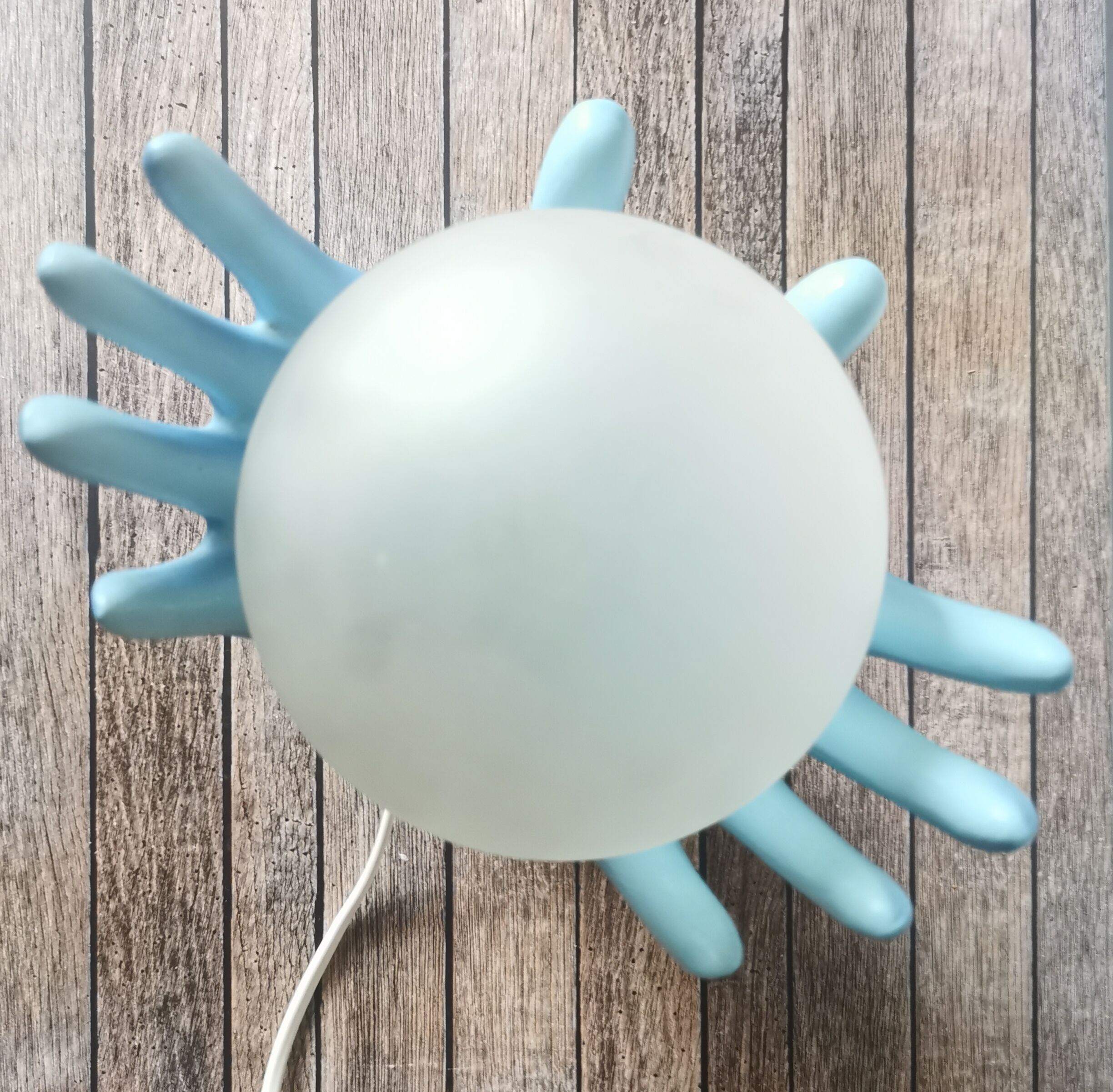 Blue ceramic hand lamp