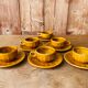 Set of 6 cups and under cups of vintage bistro coffee.