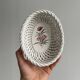 Small twisted porcelain bowl