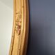 Large oval mirror gilded wood with red plate 44x66cm