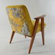Fauteuil 366 signé J.Chierowski jaune et oiseaux