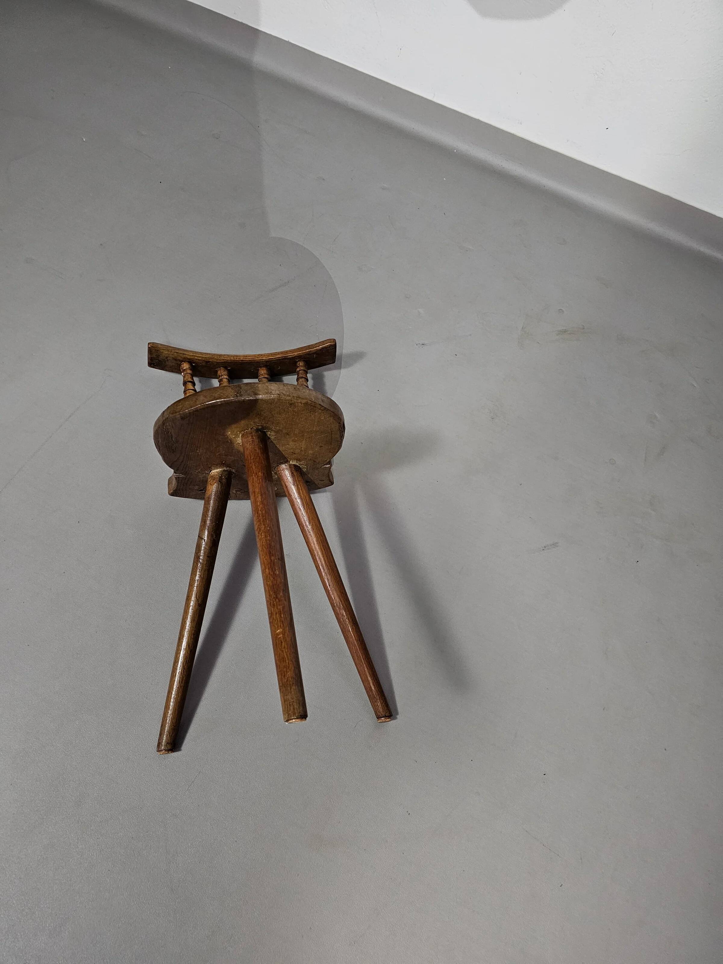 Old farmers tripod chair for decorative use