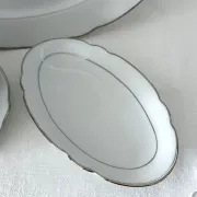 3 white porcelain plates