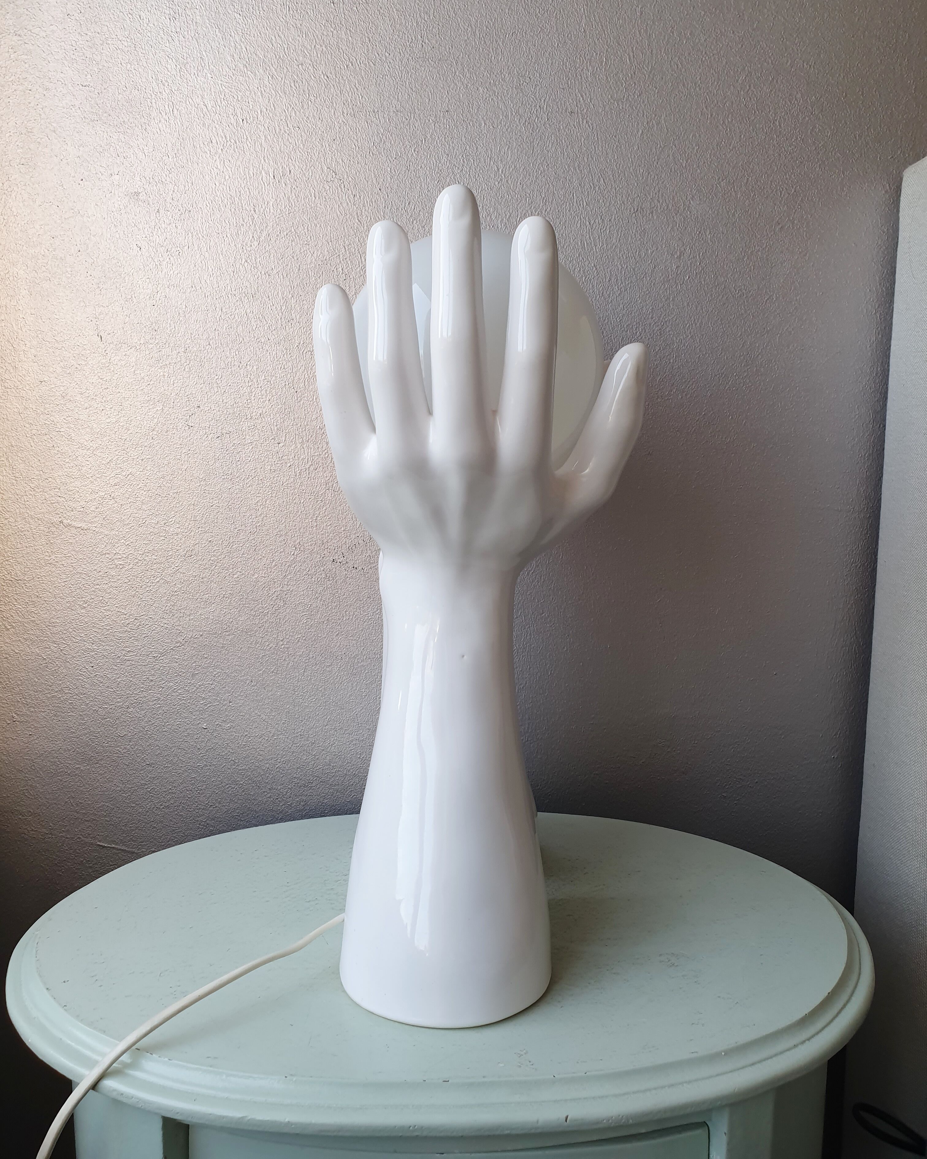 Italian design ceramic table lamp two hands and a glass sphere