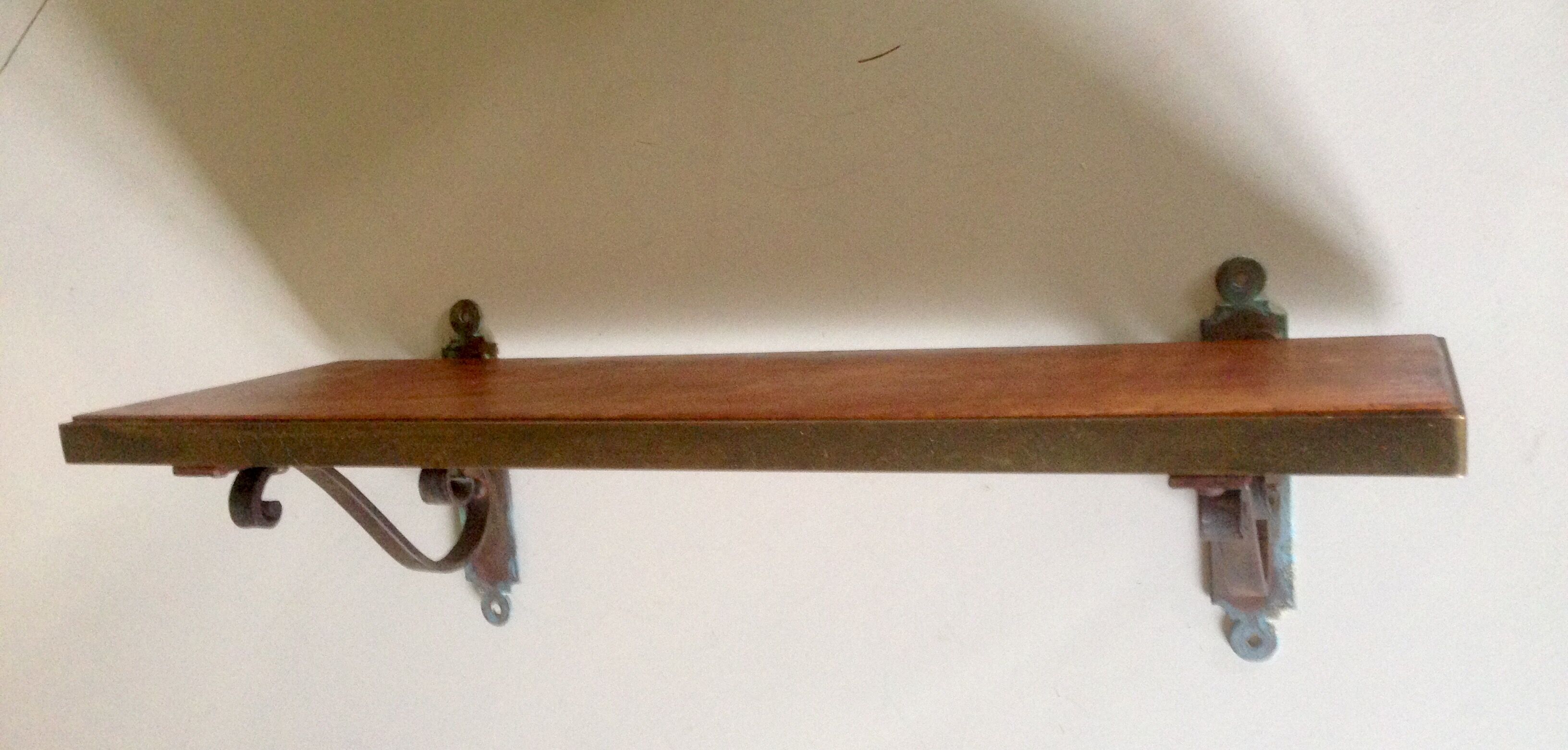 Shelf rimmed brass circa 1920