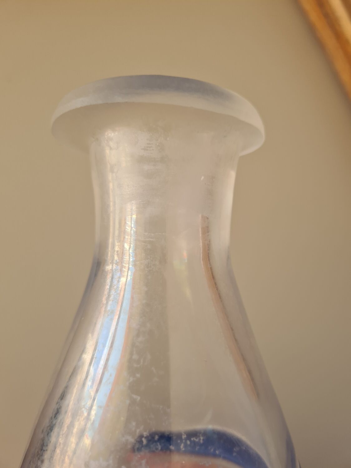 Conical glass vase/carafe blown with a blue spiral decoration.