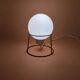 Red metal lamp with opaline globe from the 70s and 80s.