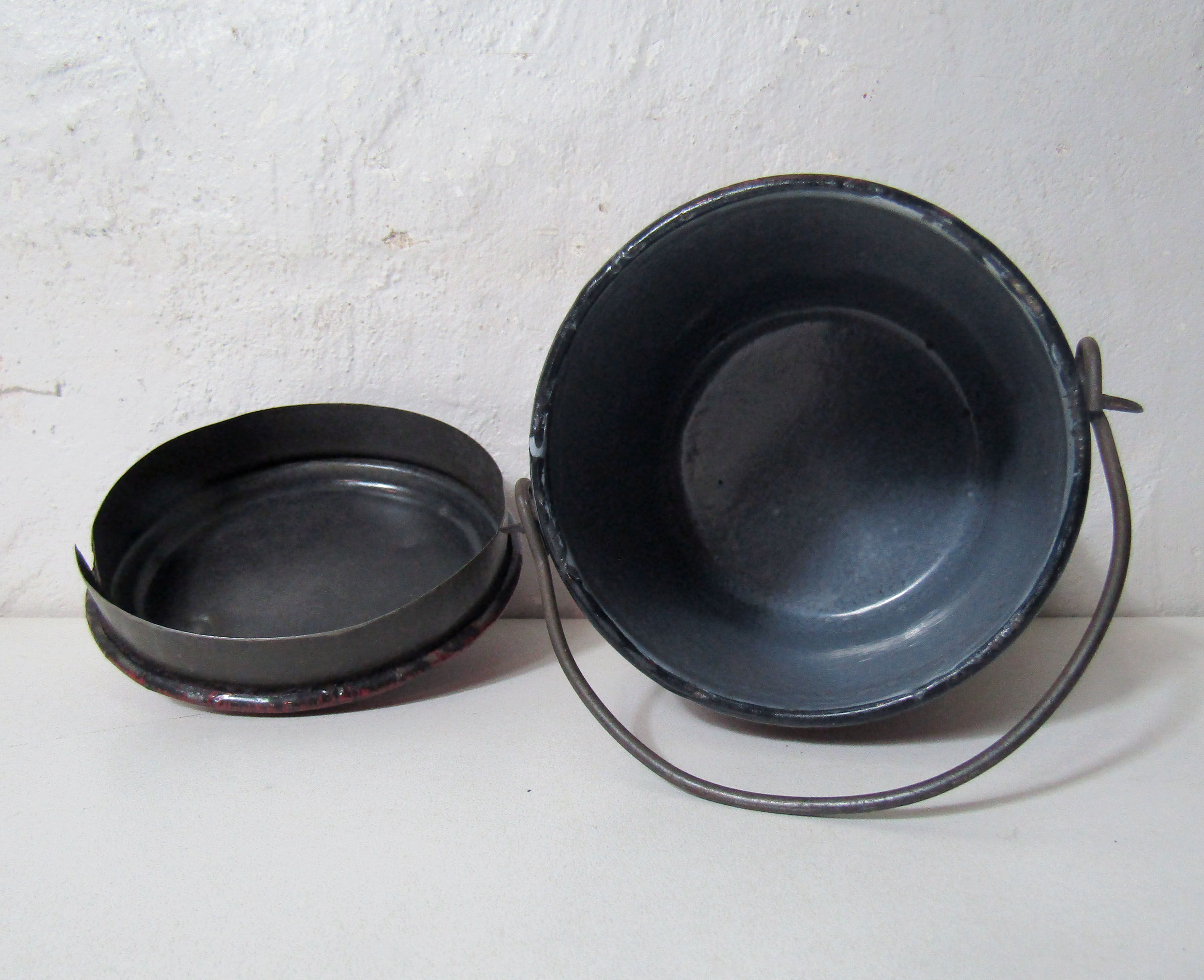 Old enamelled metal bucket pot