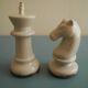 two ceramic chess pieces decorative