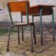 Vintage teak and solid oak schoolwork and its 50 year chair