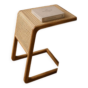 Wood and rattan bedside table made of teak wood.