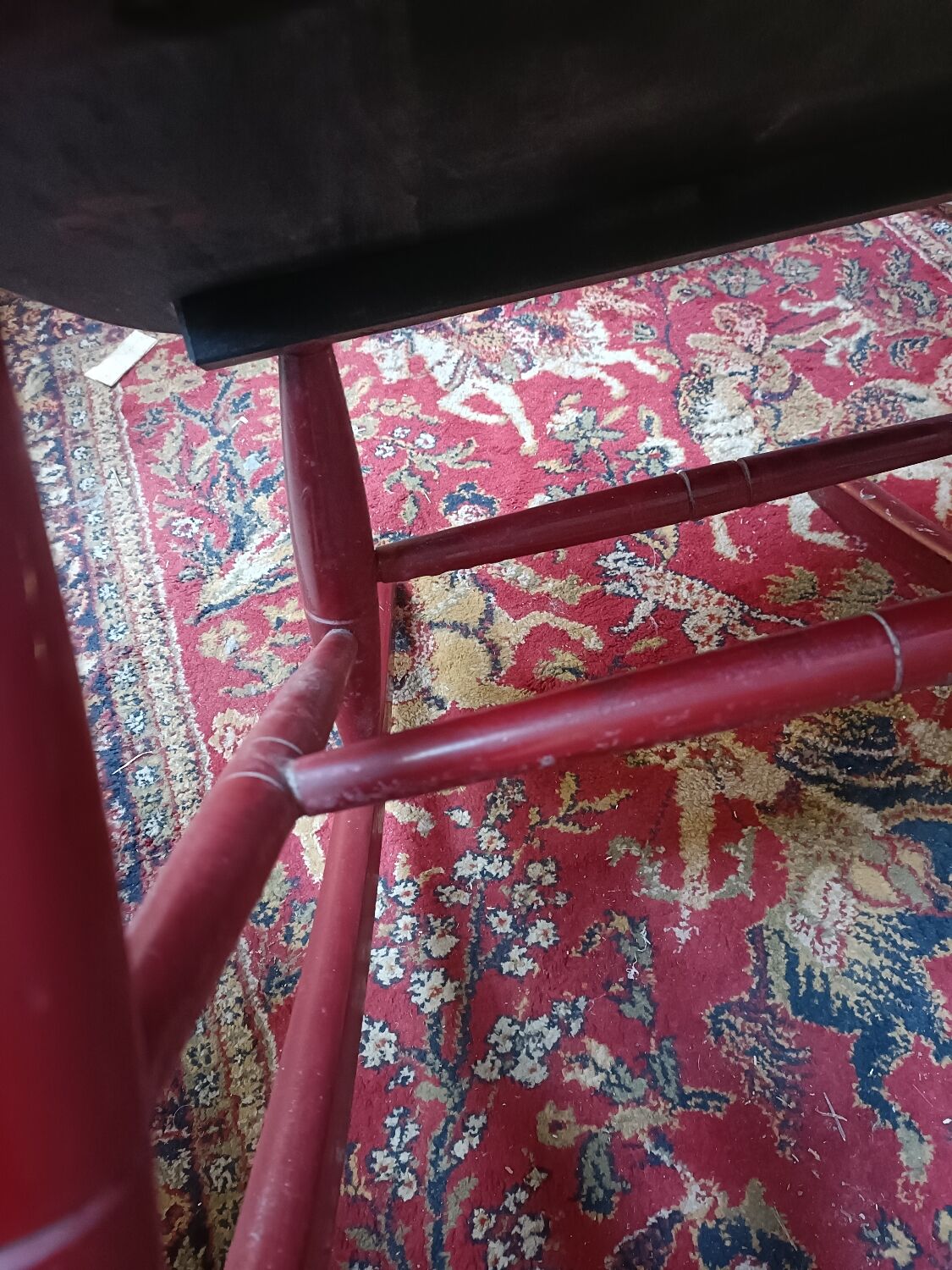 Vintage wooden rocking chair burgundy paint