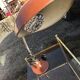 Vintage brown metal desk lamp EAKV, 1950s design, rounded shade.