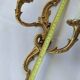Old pairs of bronze wall sconces