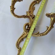 Old pairs of bronze wall sconces