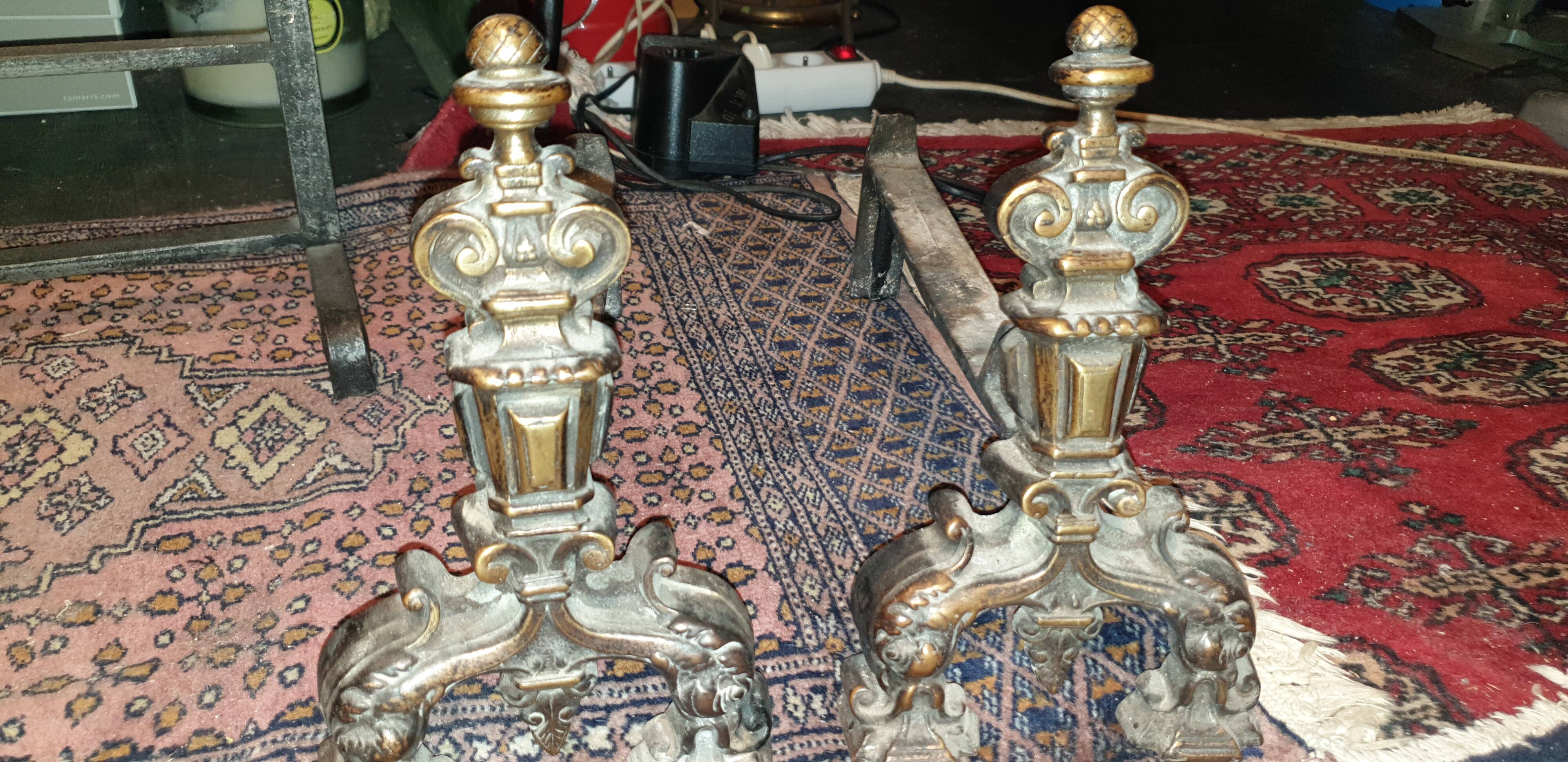 Pair of cast iron and bronze chenets