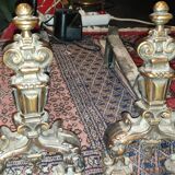 Pair of cast iron and bronze chenets