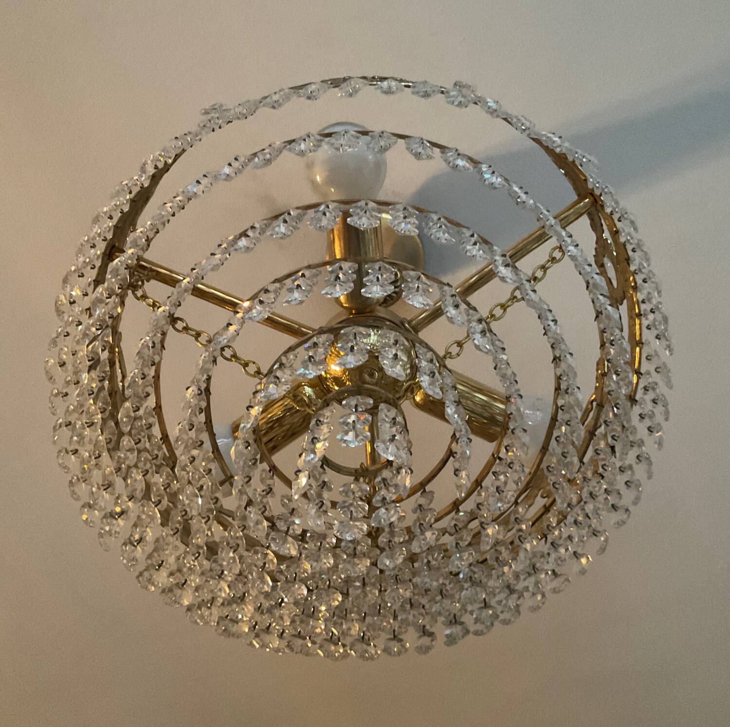 Vintage chandelier cascade of crystal and brass tassels
