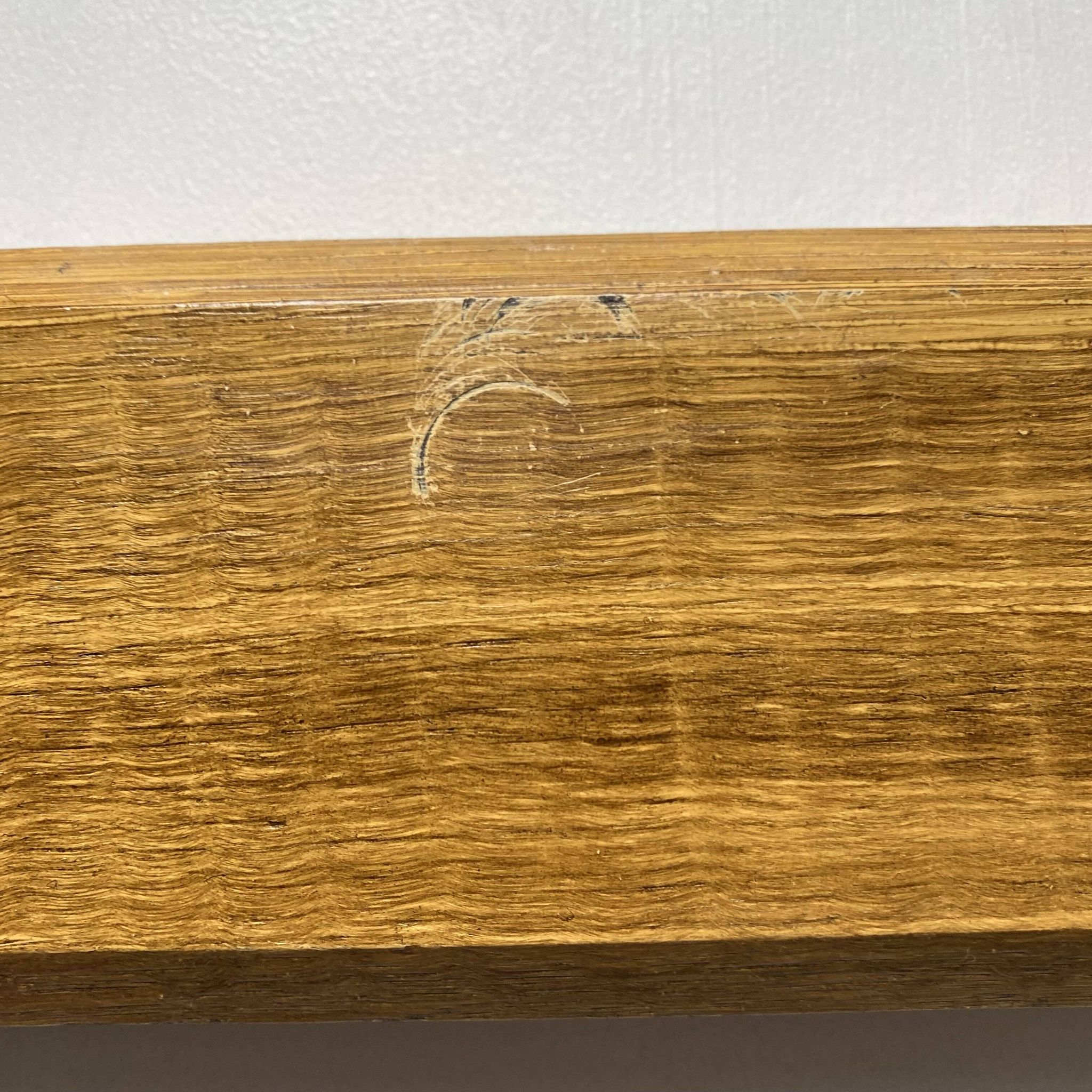 Antique wooden coat rack with metal hooks
