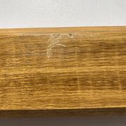 Antique wooden coat rack with metal hooks