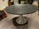 Round black top table with metal legs KARE design