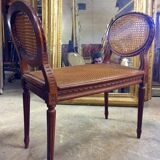 Banquette en cannage de style Louis XVI