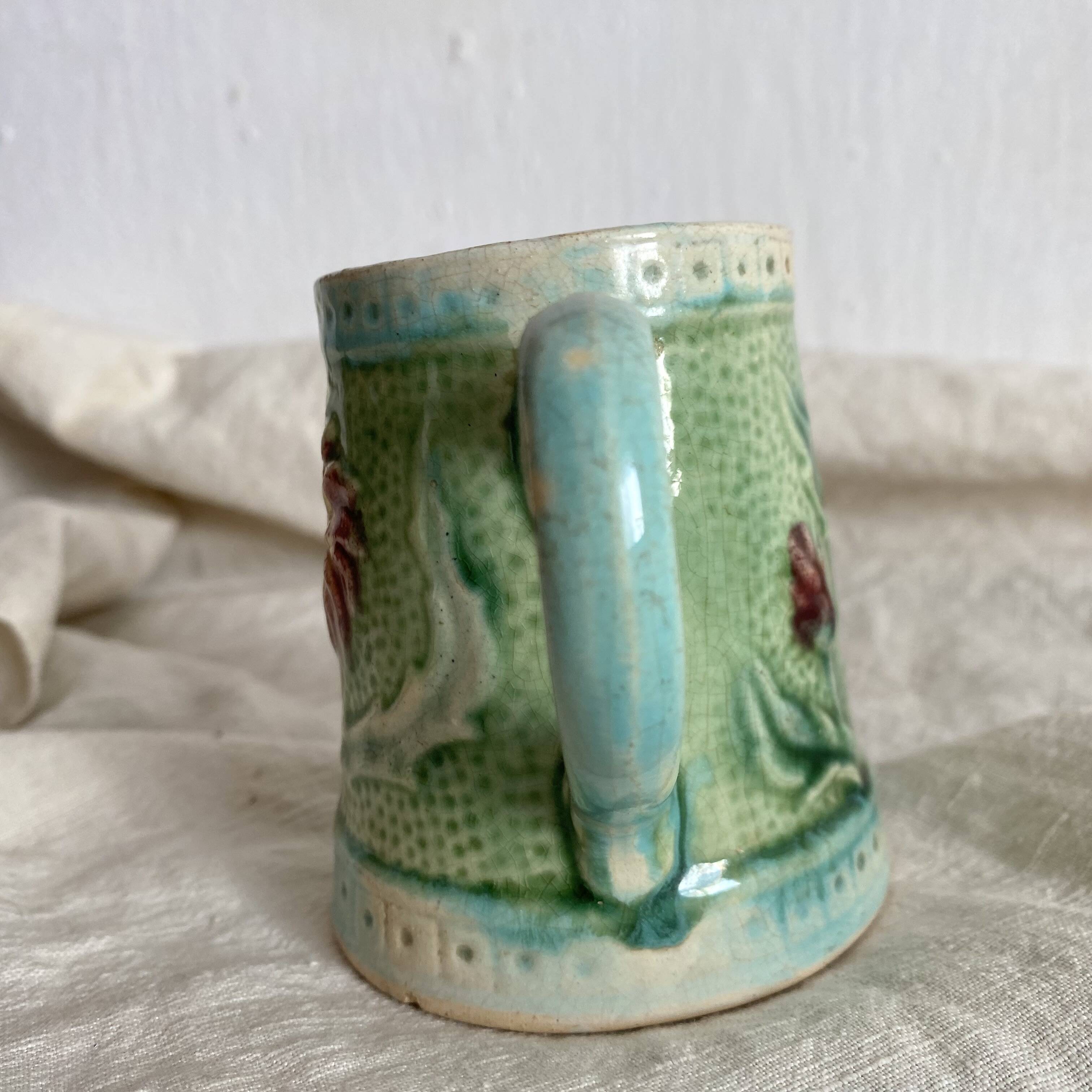 Small Art Nouveau slip milk pitcher