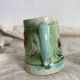 Small Art Nouveau slip milk pitcher