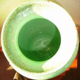 Enamelled earthenware vase with striated pattern