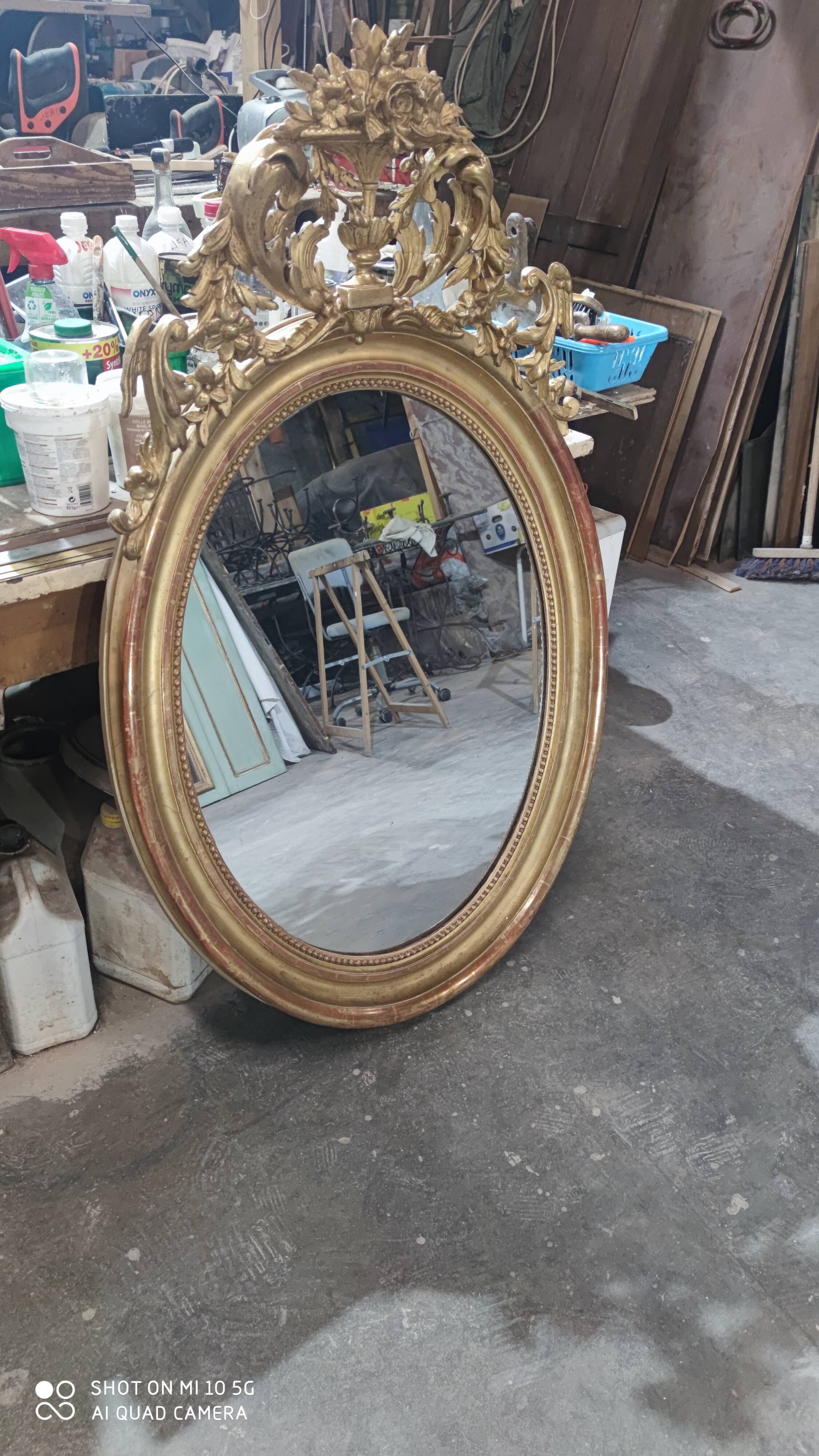 Mirror with a gilt medallion pediment, 1840