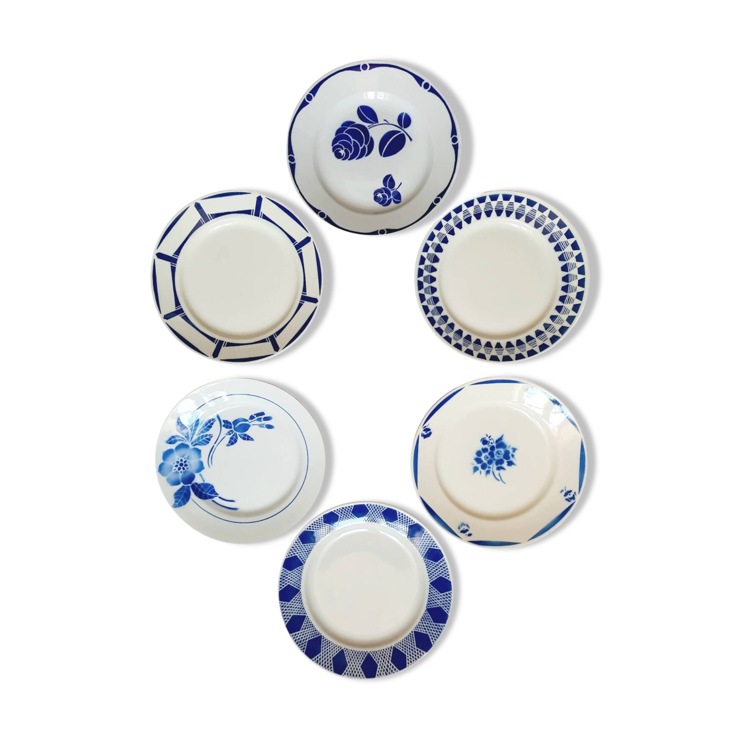 Old mismatched earthenware dinner plates