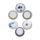 Old mismatched earthenware dinner plates