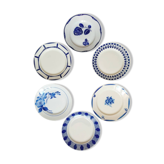 Old mismatched earthenware dinner plates