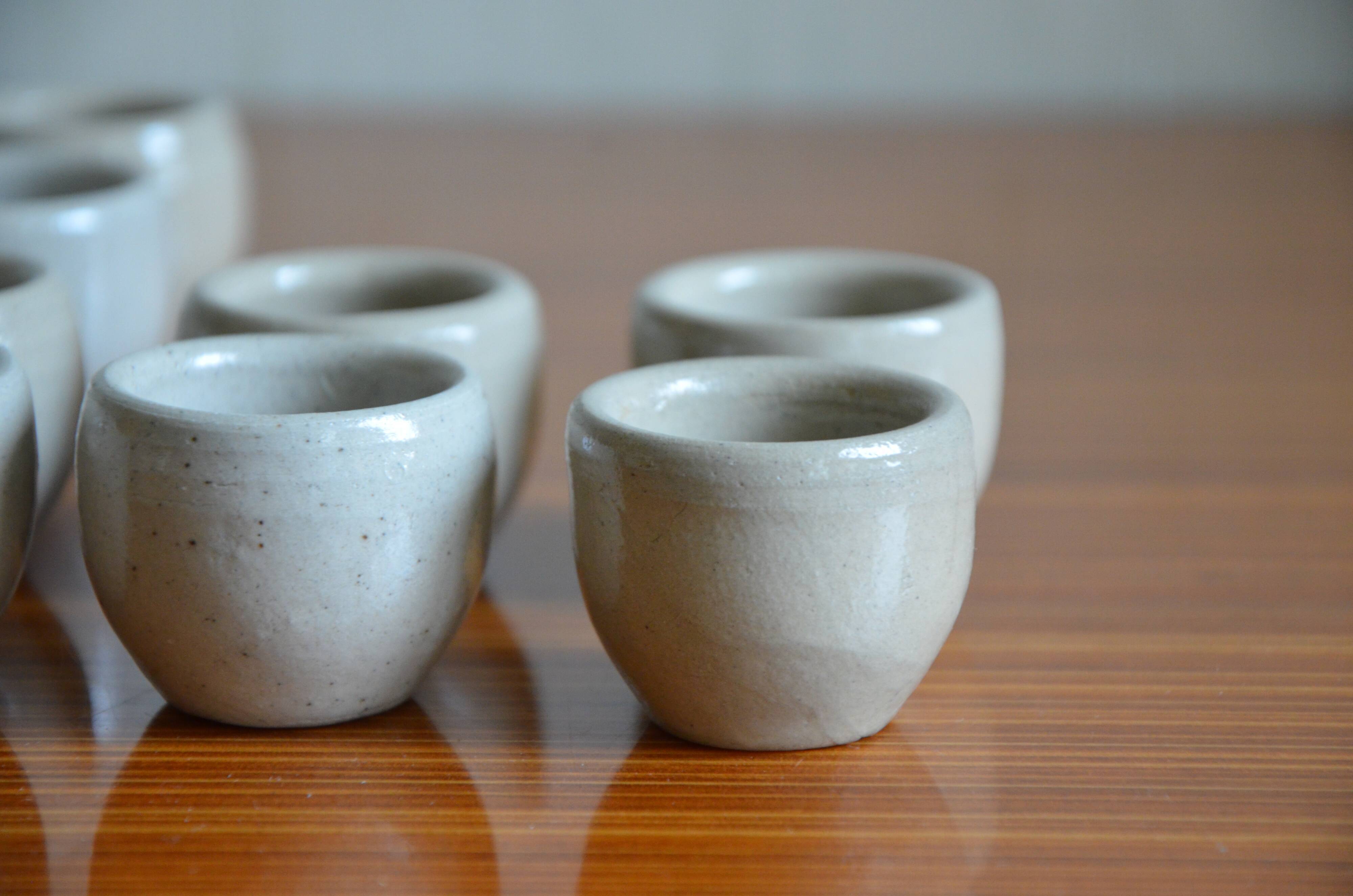 Lot of 12 grey sandstone snail buckets