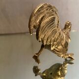 Subject to the silver metal rooster