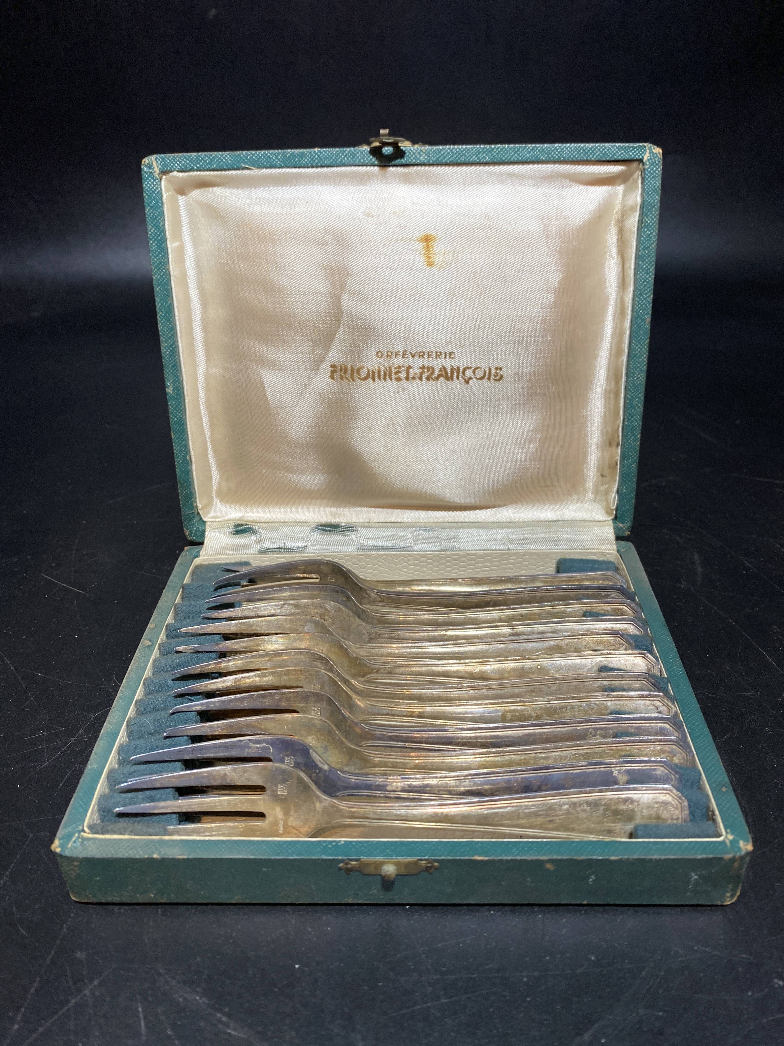 Coffret de fourchettes en métal argenté
