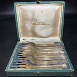 Box of forks in silver metal