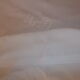 Tablecloth and 11 cotton/linen towels embroidered AD circa 1900
