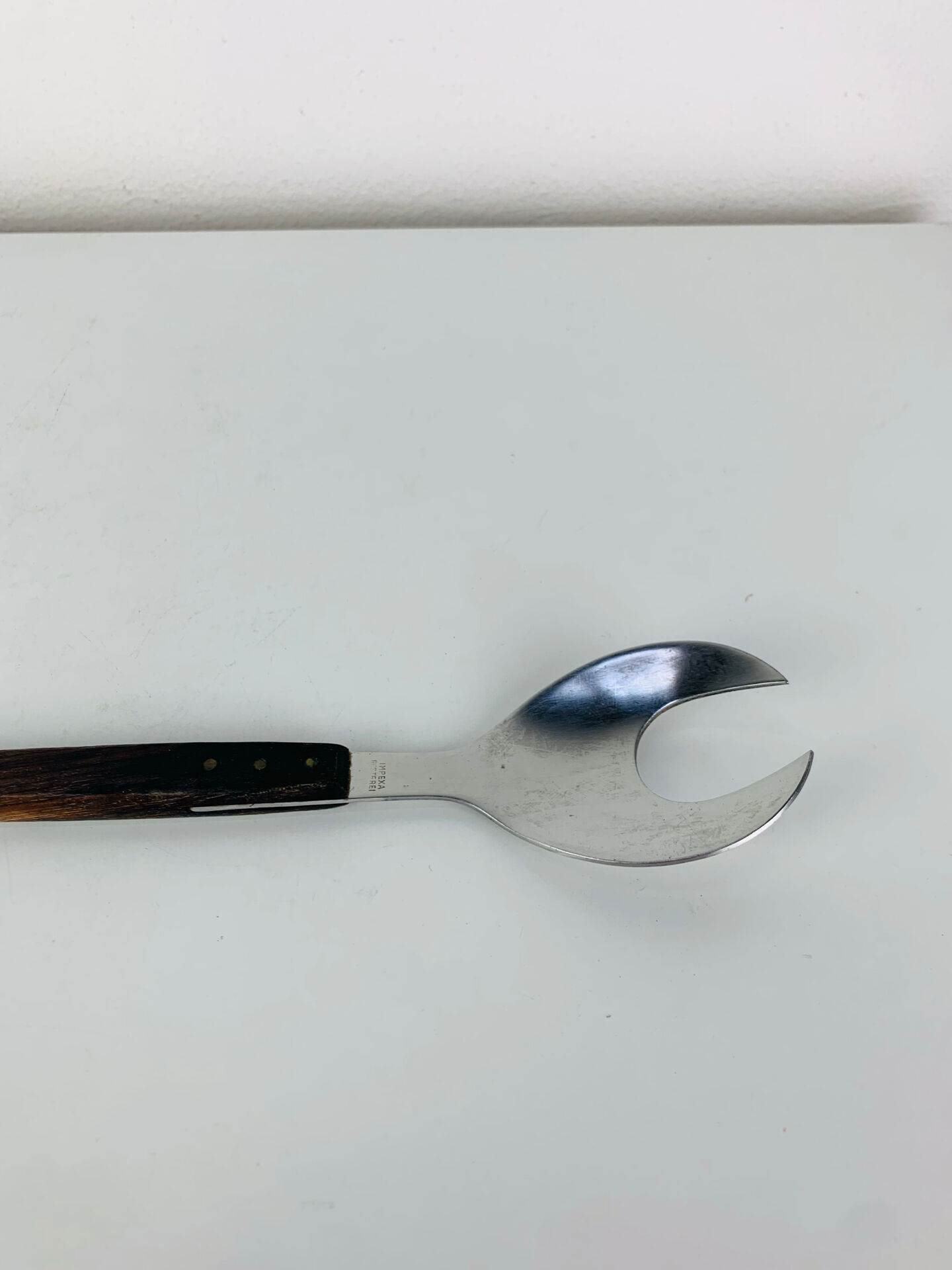 Scandinavian style service cutlery in teak and stainless steel