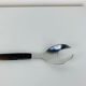 Scandinavian style service cutlery in teak and stainless steel