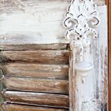 Vintage shutter renovated into a coat rack