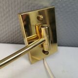 Danish Brass wall lamp with a ‘swivel’ effect.