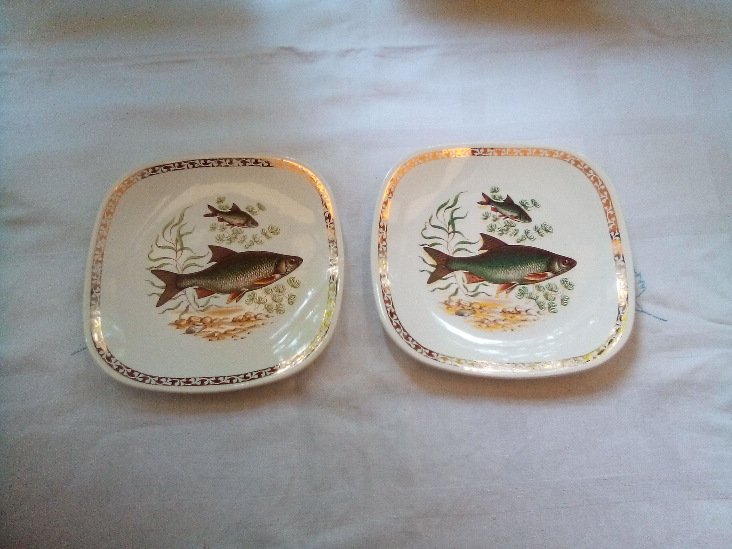 Set of 12 Longchamp plates and fish dish