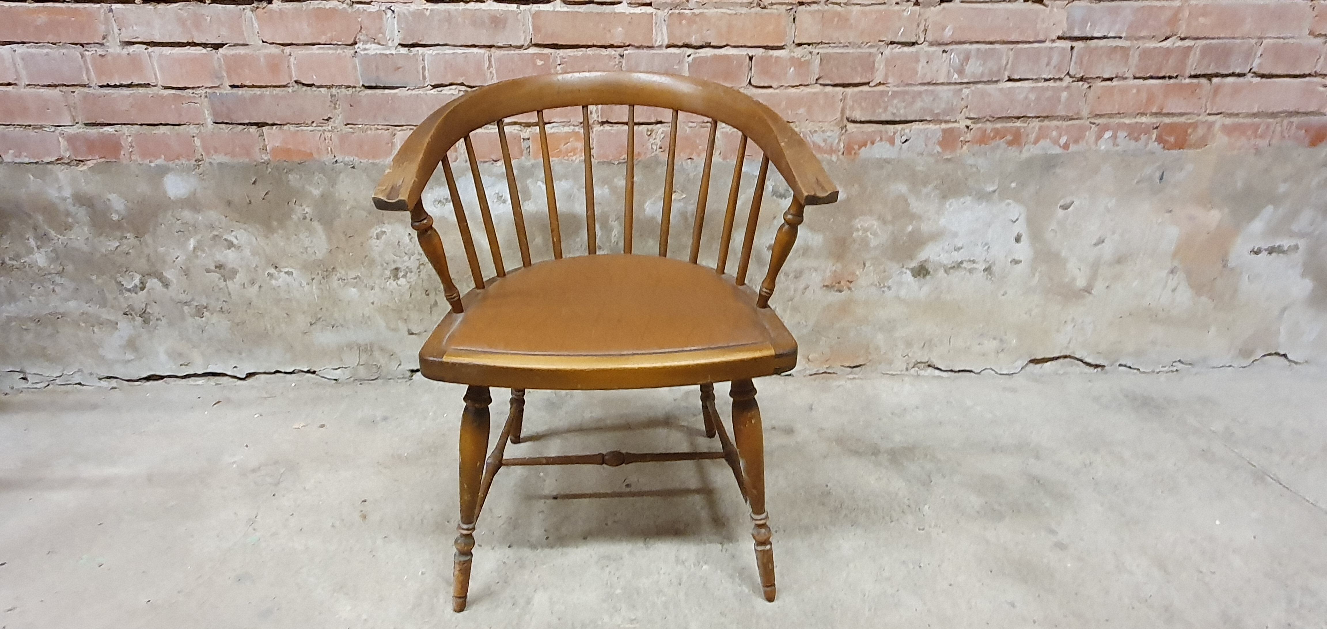 Vintage office armchair with Scandinavian style bar