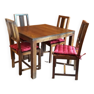Table en palissandre massif avec 4 chaises assorties