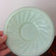 Ancienne tasse et sa soucoupe en opaline vert menthe