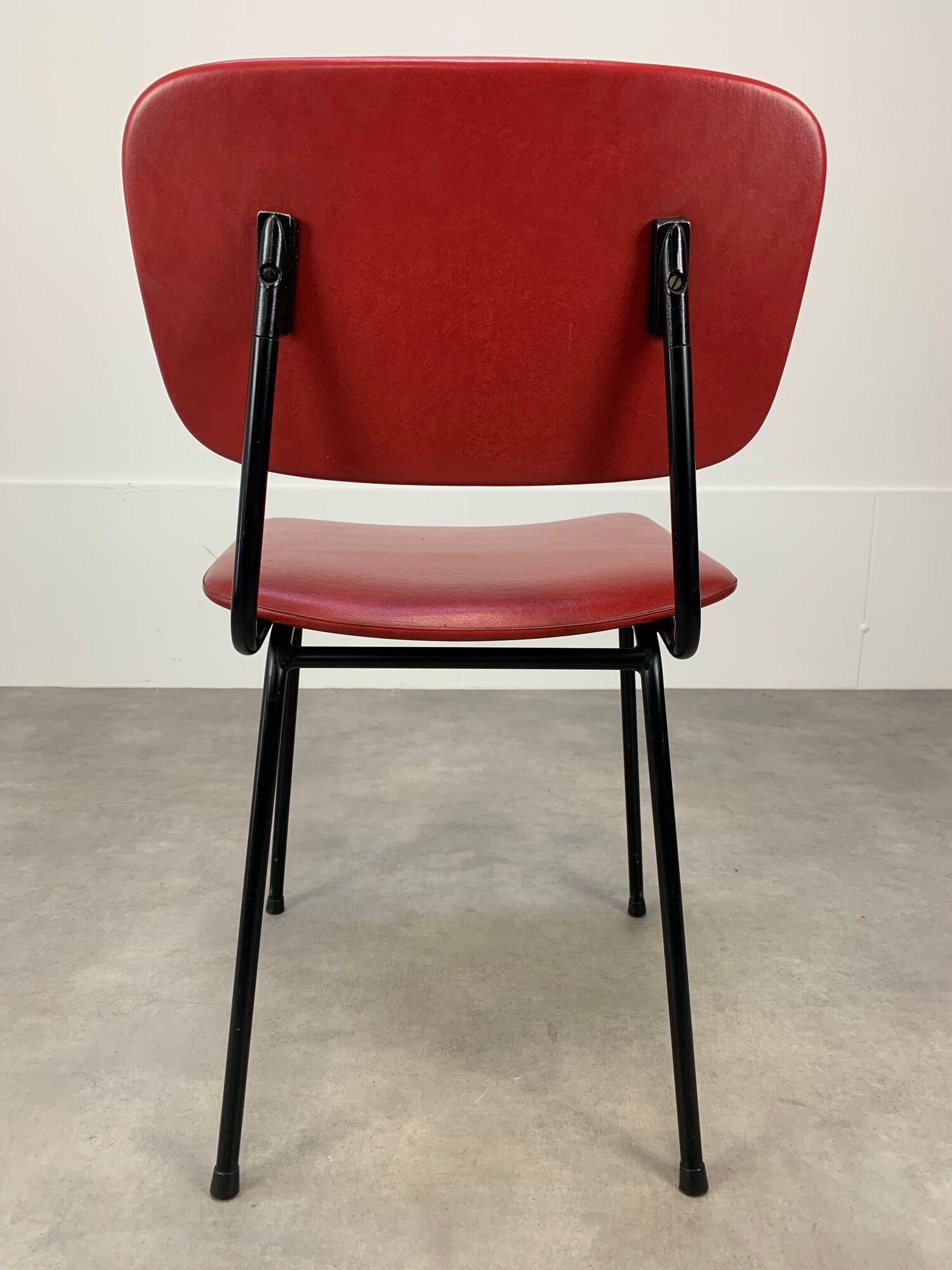 Airborne chair model Carolina Prefacto, 1950, metal and red skaï