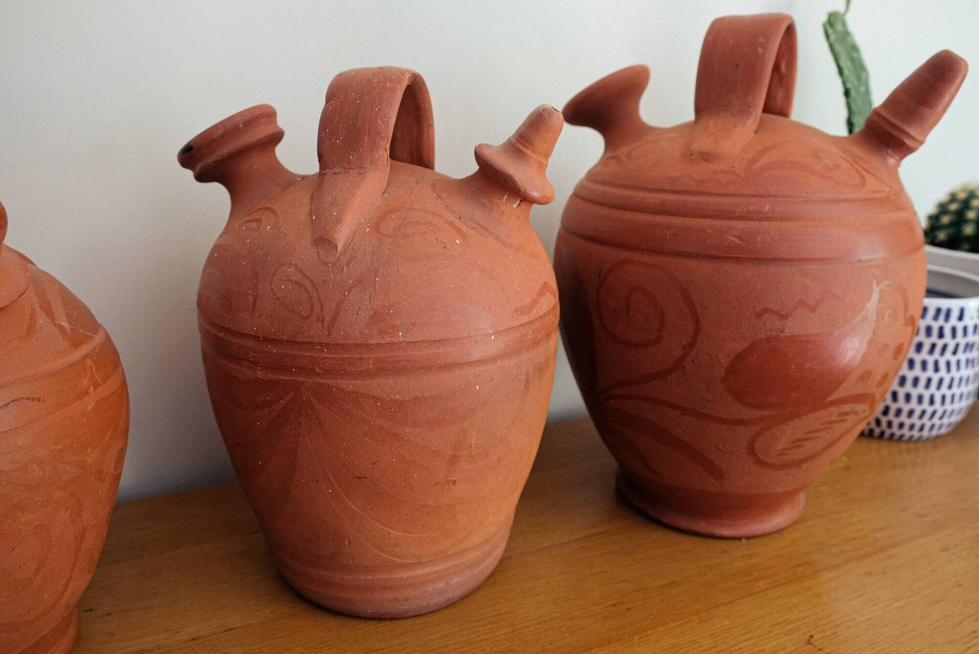 Set of 4 terracotta jugs