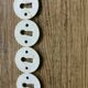 Set of 4 porcelain lock rosettes with gold screws – vintage