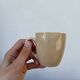 Ceramic and rattan coffee cups